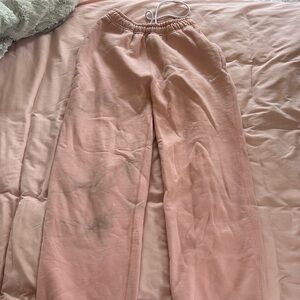 Pink nike sweatpants size extra small. They do have stains.